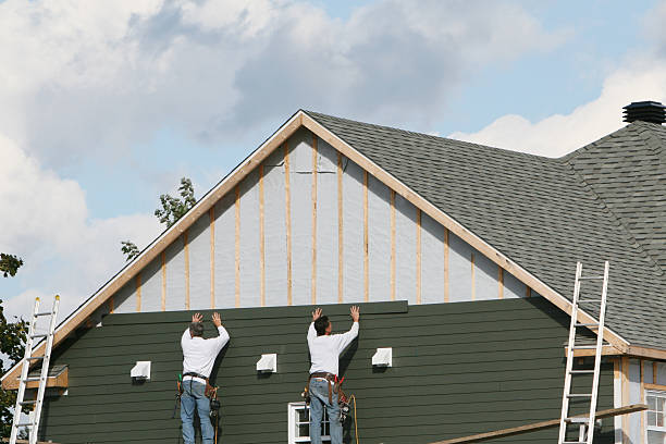 Professional Siding Installation technician working in Winesburg, OH